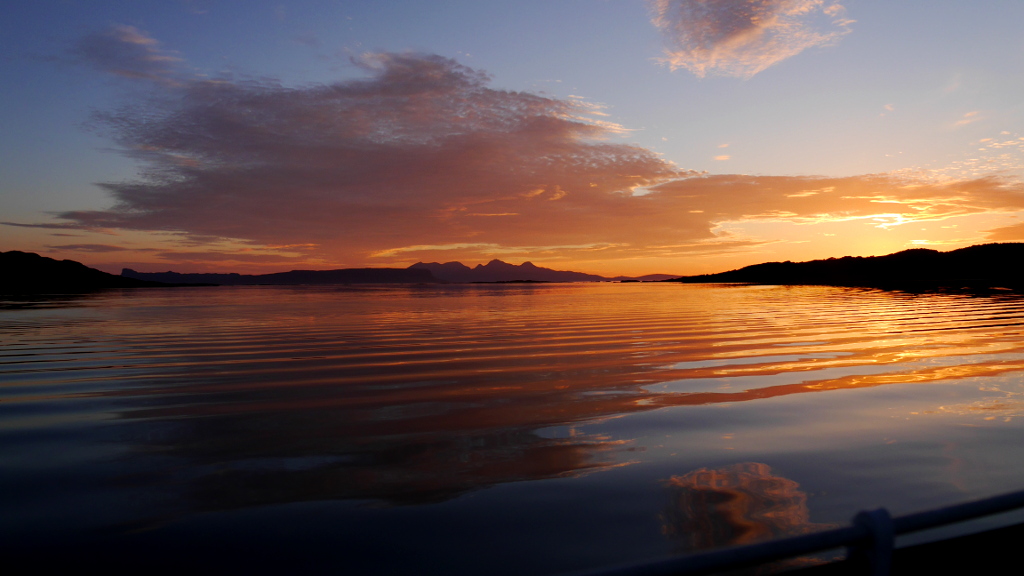 At anchor in Arisaig looking towards the Isles of Eigg and Rum