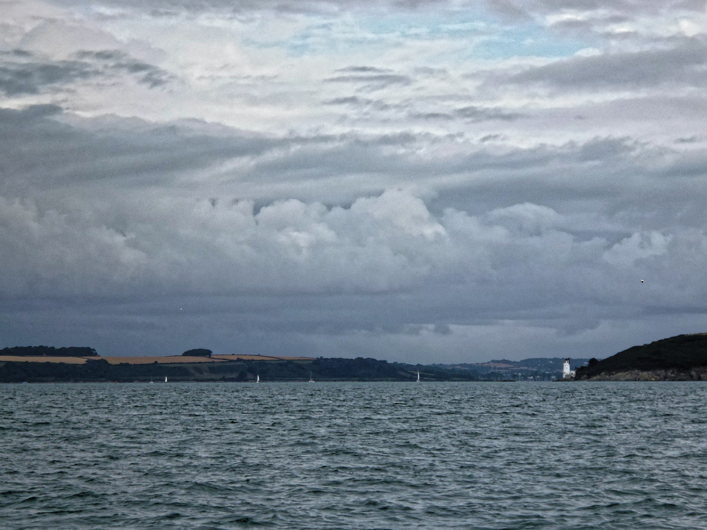 Falmouth St Anthonys under dark forbidding clouds
